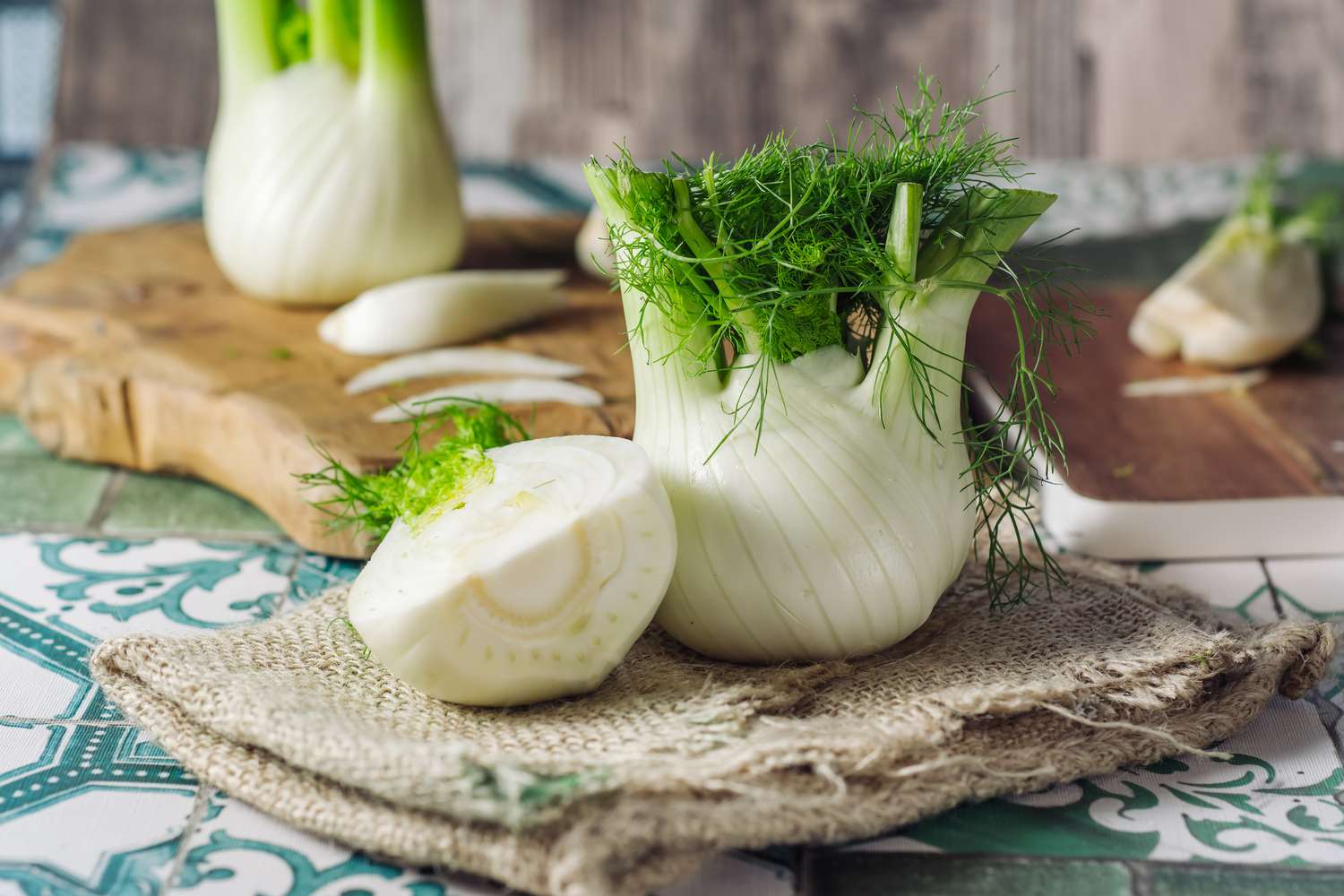 Fresh raw fennel on cutting board and cloth