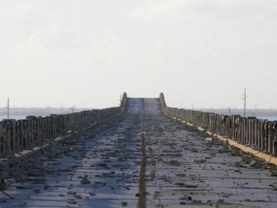 Dilapidated road leading off into the distance