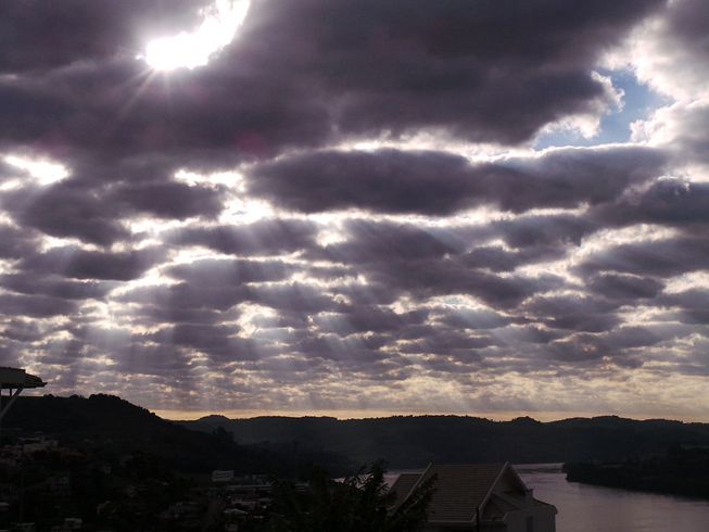 Stratocumulus stratiformis clouds over a river
