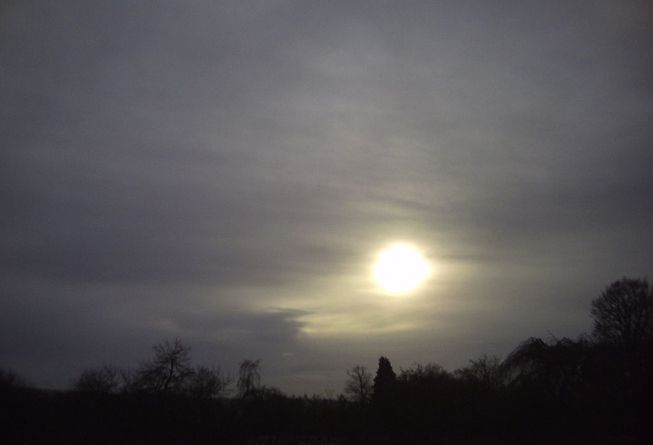 The sun is hazy through an altostratus translucidus