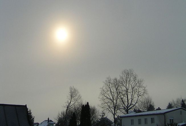 Sun peeks through an altostratus cloud