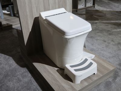 A closed-lid image of a rectangular toilet