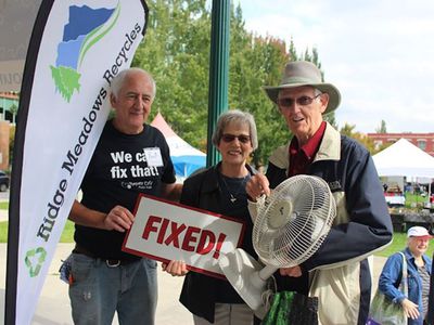 Group of people at a recycle and repair rally
