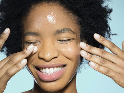 woman applying face cream