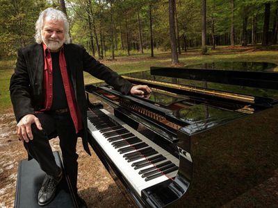Chuck Leavell and piano in the trees