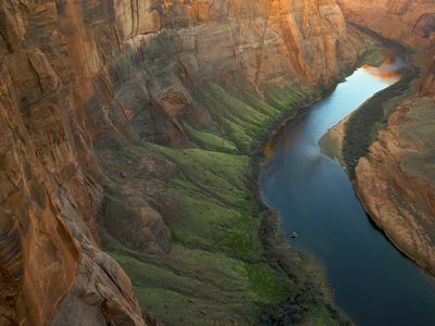 Aerial view of the Colorado river against rock formations in Arizona