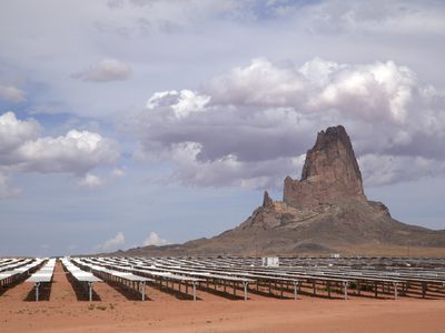 Rows of solar panels gleam in the sun, part of the Kayenta II Solar project on the Navajo Nation.