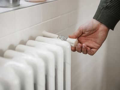 Trying to turn the heat up on home radiator heater, new world economic crisis