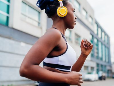 woman in sports bra with headphones